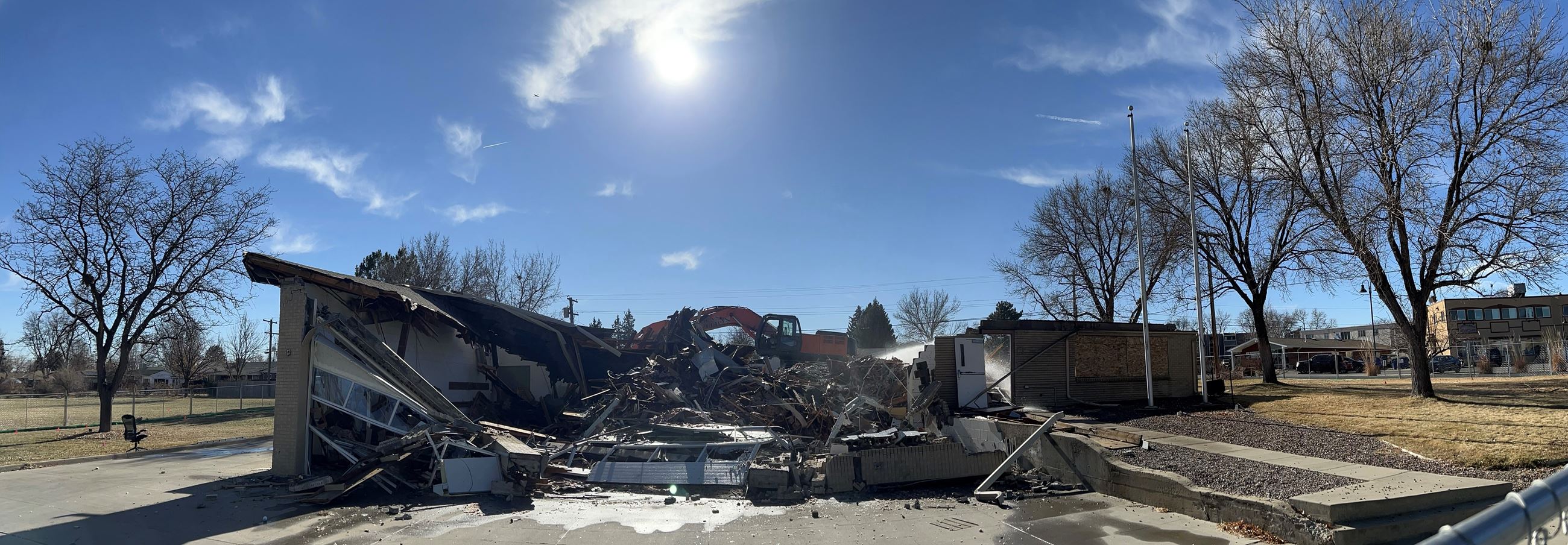 Photo of a crane and debris from demolition of Station 61