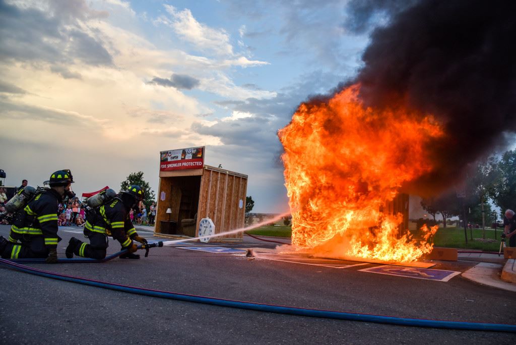 Fire Fighters Showing How to Fight a Fire